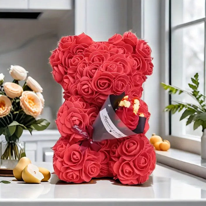 Rose bear with a bouquet of everlasting flowers