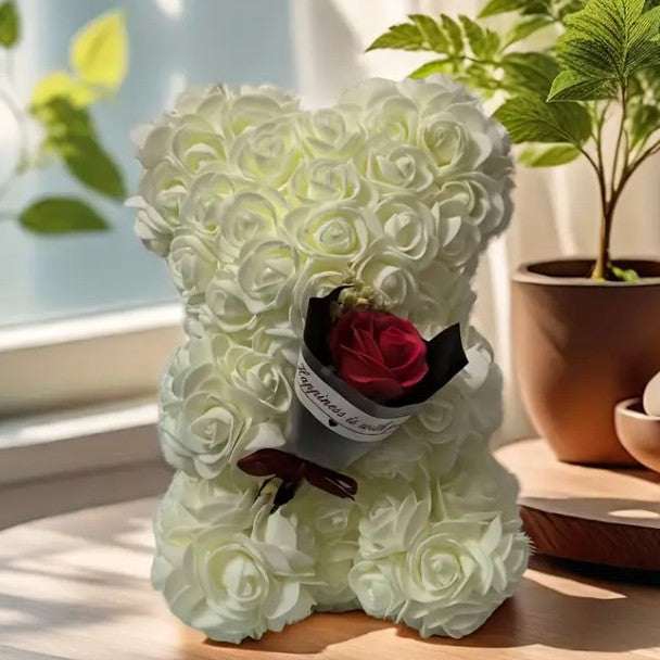 Rose bear with a bouquet of everlasting flowers
